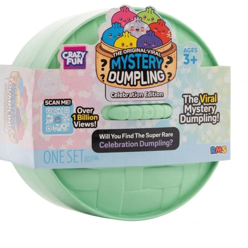 Crazy Fun The Original Viral Mystery Dumpling Celebration Edition in its retail packaging, featuring a mint green plastic container with a colorful cartoon dumpling illustration on top and a white, pink, and blue cardboard sleeve.